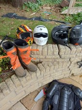 Moterbike Helmet And Boots And Protection Gear