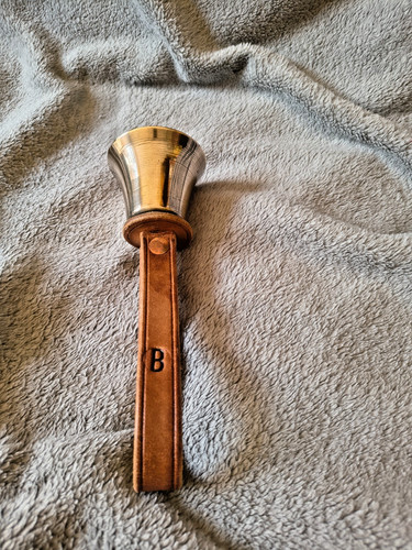 Hand bell - in, b)