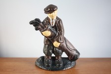 Vintage Cast Iron Golfing