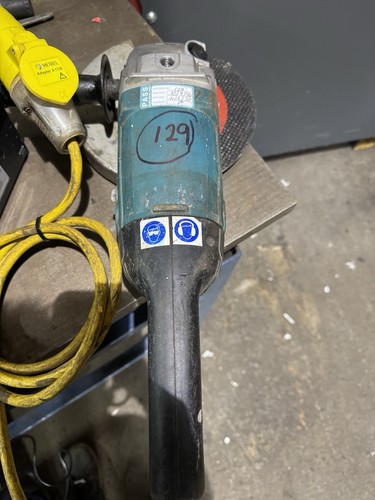 Makita grinder 110v good - 9”,