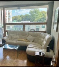 Leather  corner suite with matching Love  Seat and ottoman