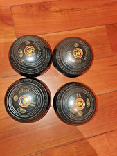 Set of 4 lawn bowls Size 1 made By GREENMASTER black cockerel emblem