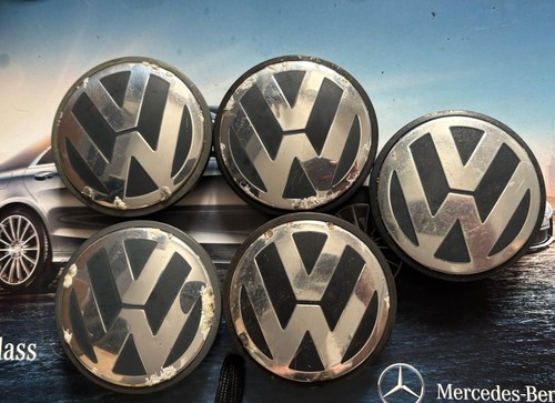 Five volkswagen wheel center - volkswagen,