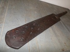 tawse/cane genuine dense leather paddler with 13 grip vents