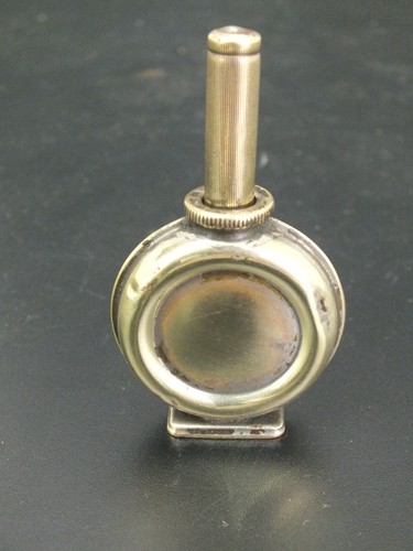 Scarce vintage round - brass, oil
