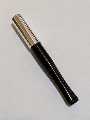 Ronson cigarette holder with - cigarette,