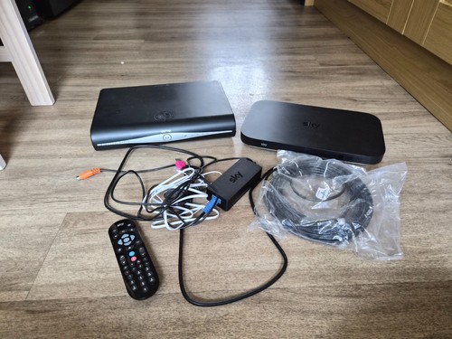 Two sky boxes one missing - two,