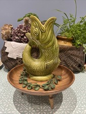 A green gluggle  vase by