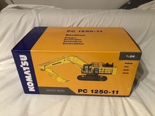 Komatsu PC1250-11 Mining Excavator with Bucket Yellow NZG 1:50 Diecast Model