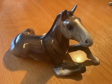 BESWICK  GLOSSY BROWN LYING