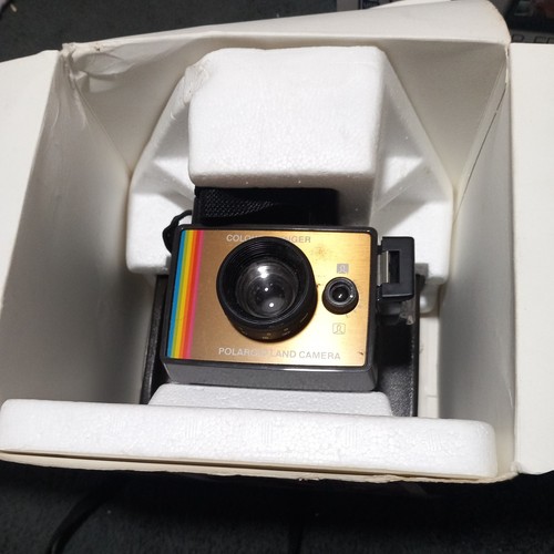 Polaroid land camera colour - land,
