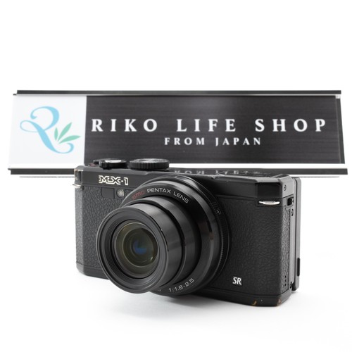 Pentax black compact - pentax,
