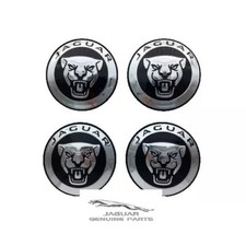 Genuine new Jaguar black wheel centre caps