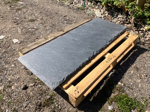 Natural raw edge slate hearth - edge,