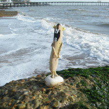 Driftwood weasel [sculpture]