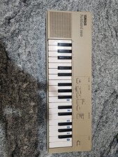 Yamaha PortaSound PSS-110 Mini Electronic Keyboard 32-Key