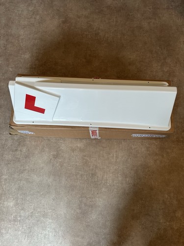 Learner driving instructor car - learner,