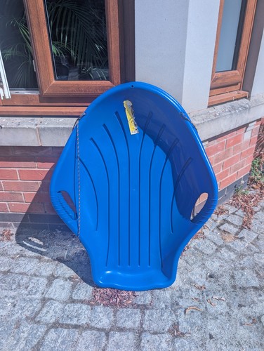 Two plastic snow sleds - plastic, hardly