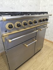 FALCON 90 CM DUAL FUEL RANGE COOKER IN ST. STEEL AND GOLD.  Ref--ED305