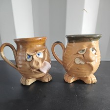 2 X  funny / Ugly face pottery