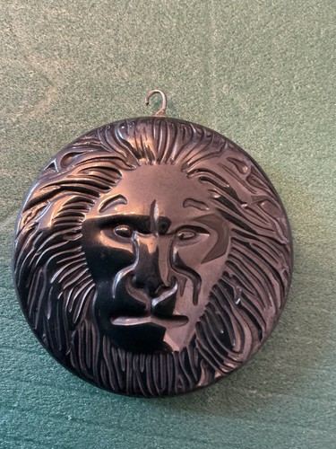 Large carved hematite lion - carved,