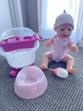 Baby Born Girl Doll with Bath Bottle and Potty and Accessories