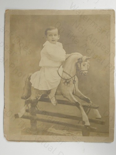 Young boy rocking horse toy - horse,