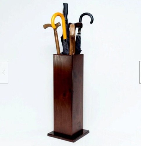 Wooden umbrella stand tick