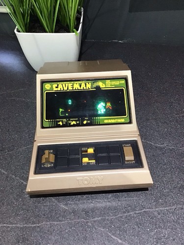 Tomy caveman electronic game - tomy,