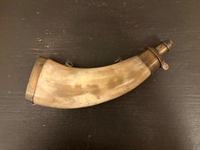 Antique powder flask, pressed