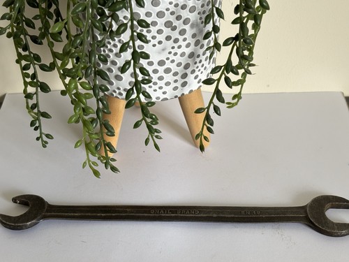Vintage snail brand - snail, spanner
