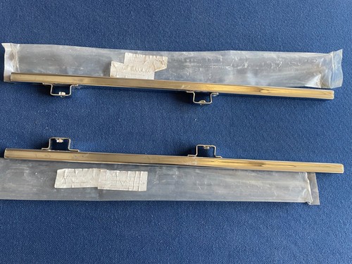 Pair chrome door - of,
