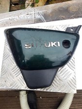 suzuki marauder gz 125  side panel ,slight damage but repairable.