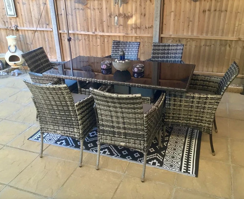 Grey rattan dining table - table, and