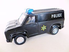 'FORD/CHEVROLET/GMC DIECAST TOY US POLICE VAN' BLACK.  1:36?