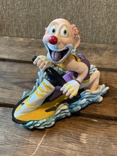 Slapstix clown figure, riding a jetski