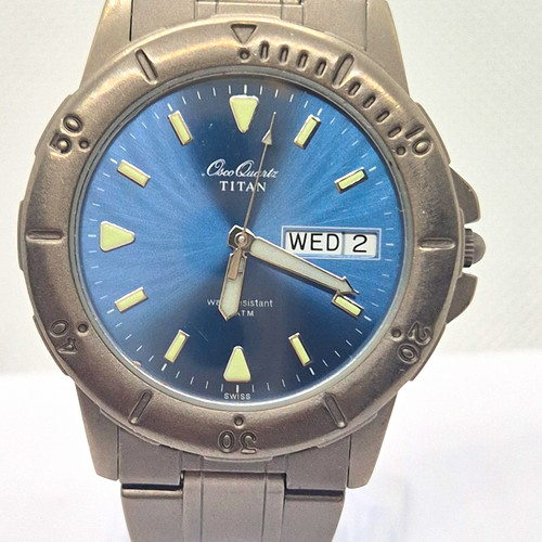 Titan oso quartz blue dial - titan,