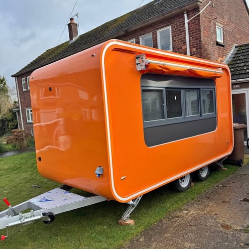 Orange mobile food trailer - mobile,