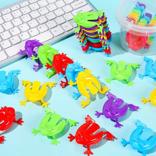 Plastic jumping frog - jumping,