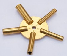 Clock spider keys brass