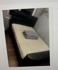 Black Ottoman TV Bed + 32”