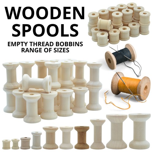 Wooden spools empty bobbins - bobbins,