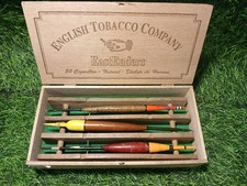 Three Vintage Cork Fishing Floats On A  Line Winder In An Old Cigar Box.