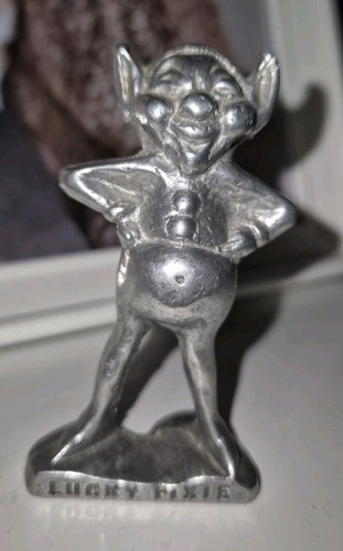 Metal lucky pixie figure - lucky,