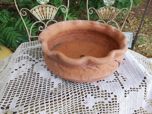 Old terracotta garden plant - old,