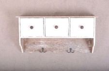 Wall shelf hanging cabinets in country house style cottage