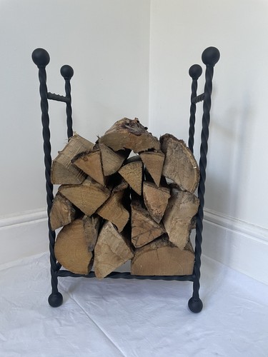Made wrought iron log - made,
