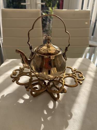 Engraved brass teapot with - engraved,