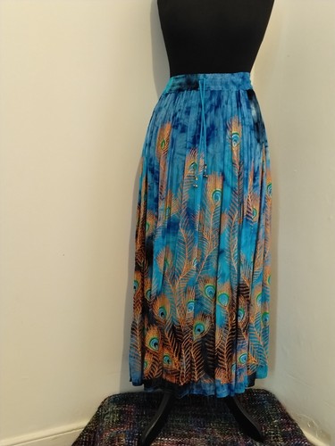 Long turquoise tie dye peacock