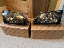 Genuine Brand New boxed Toyota Starlet Glanza EP91 headlights.